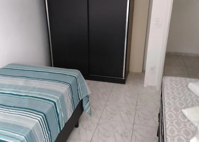 Apartamento com 4 quatros em frente a praia em Pitangueiras - Guarujá